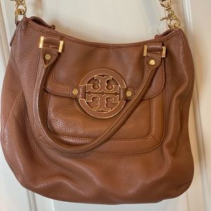 Tory Burch brown leather saddle bag with crossbody strap